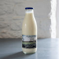 Ridley's raw milk in a 1 litre glass bottle